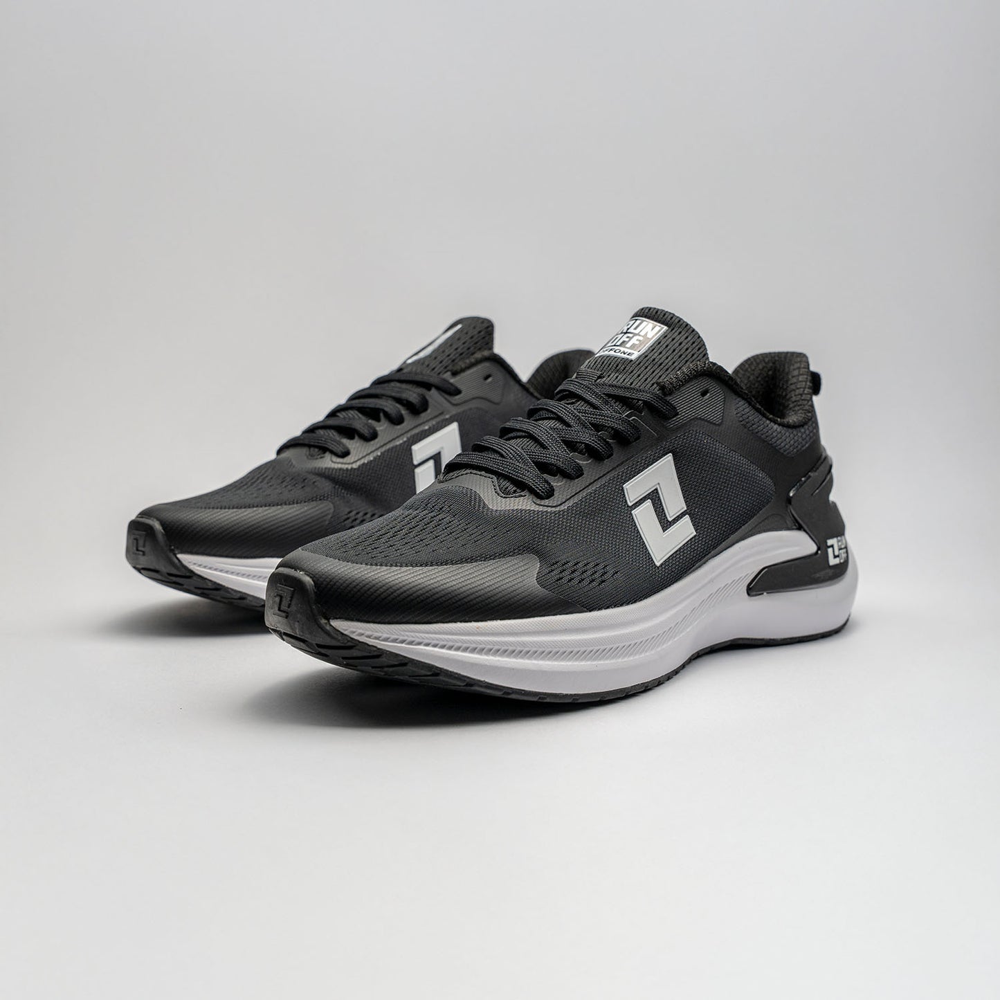 RUNOFF TENIS RUNNING HOMBRE NEGRO BLANCO 621346 002 LIVIANOS Y COMODOS